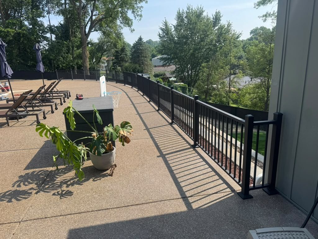 Black aluminum railing on a pool deck patio, JL Home Builders, Pittsburgh