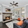Finished basement family room with fireplace and sectional
