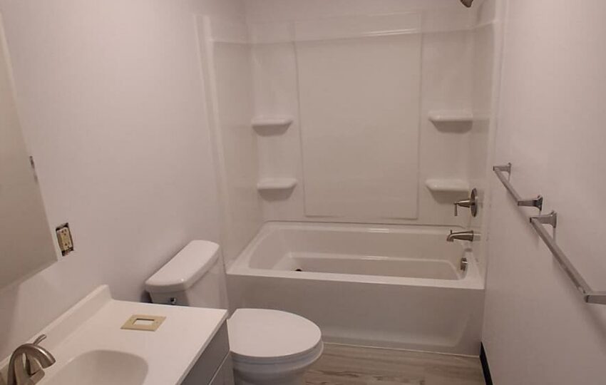 Finished Bathroom With Tub Surround And Vanity by JL Home Builders, Pittsburgh