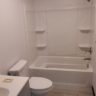 Finished Bathroom With Tub Surround And Vanity by JL Home Builders, Pittsburgh