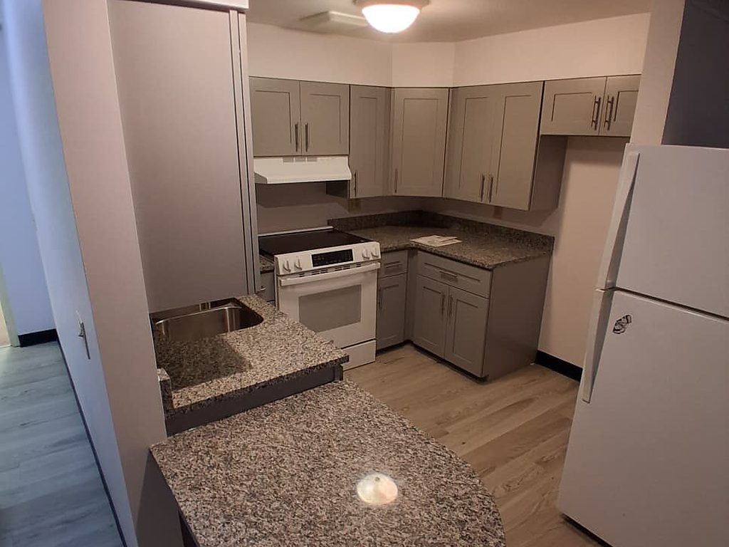 Finished kitchen with granite peninsula and stainless appliances, JL Home Builders, Pittsburgh