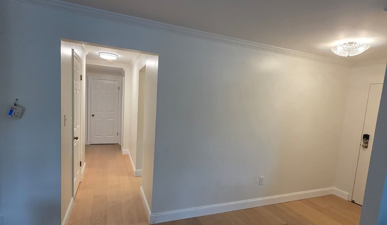 Freshly Painted Room With New Hardwood Floors by JL Home Builders, Pittsburgh