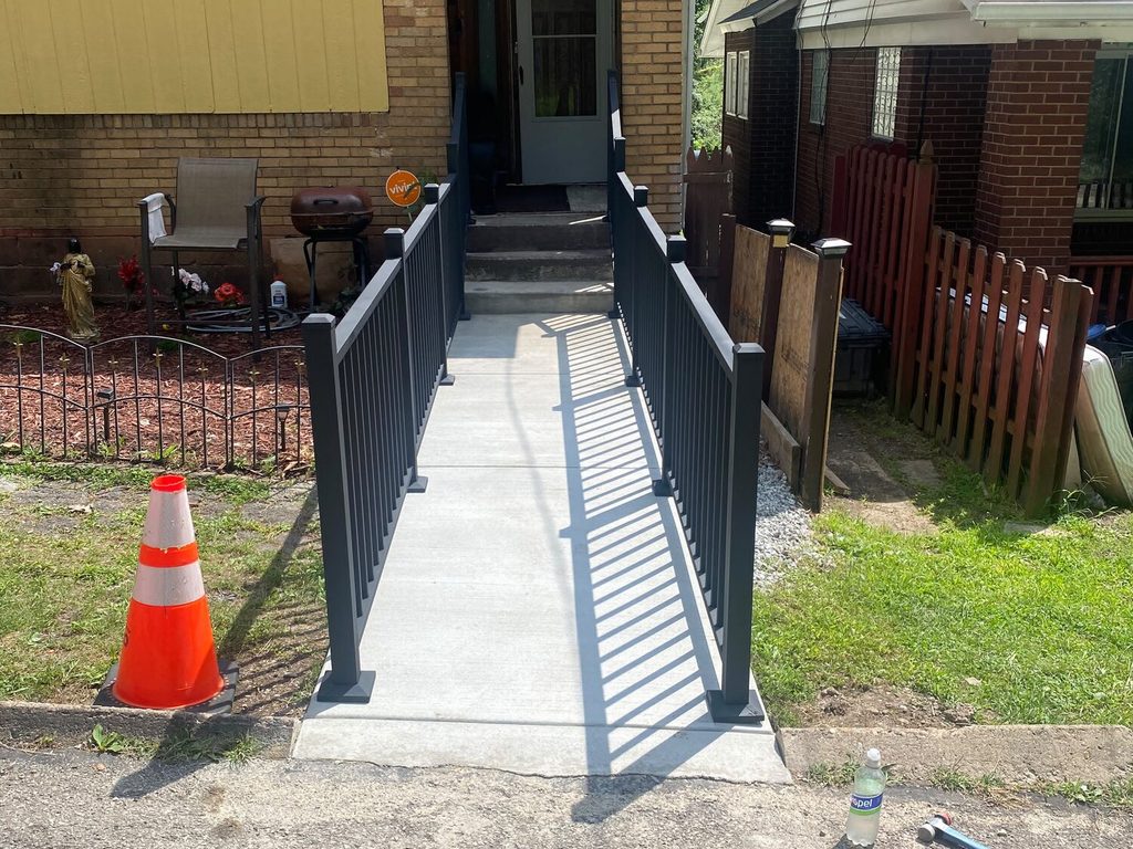 Front walkway with black aluminum railings, JL Home Builders, Pittsburgh