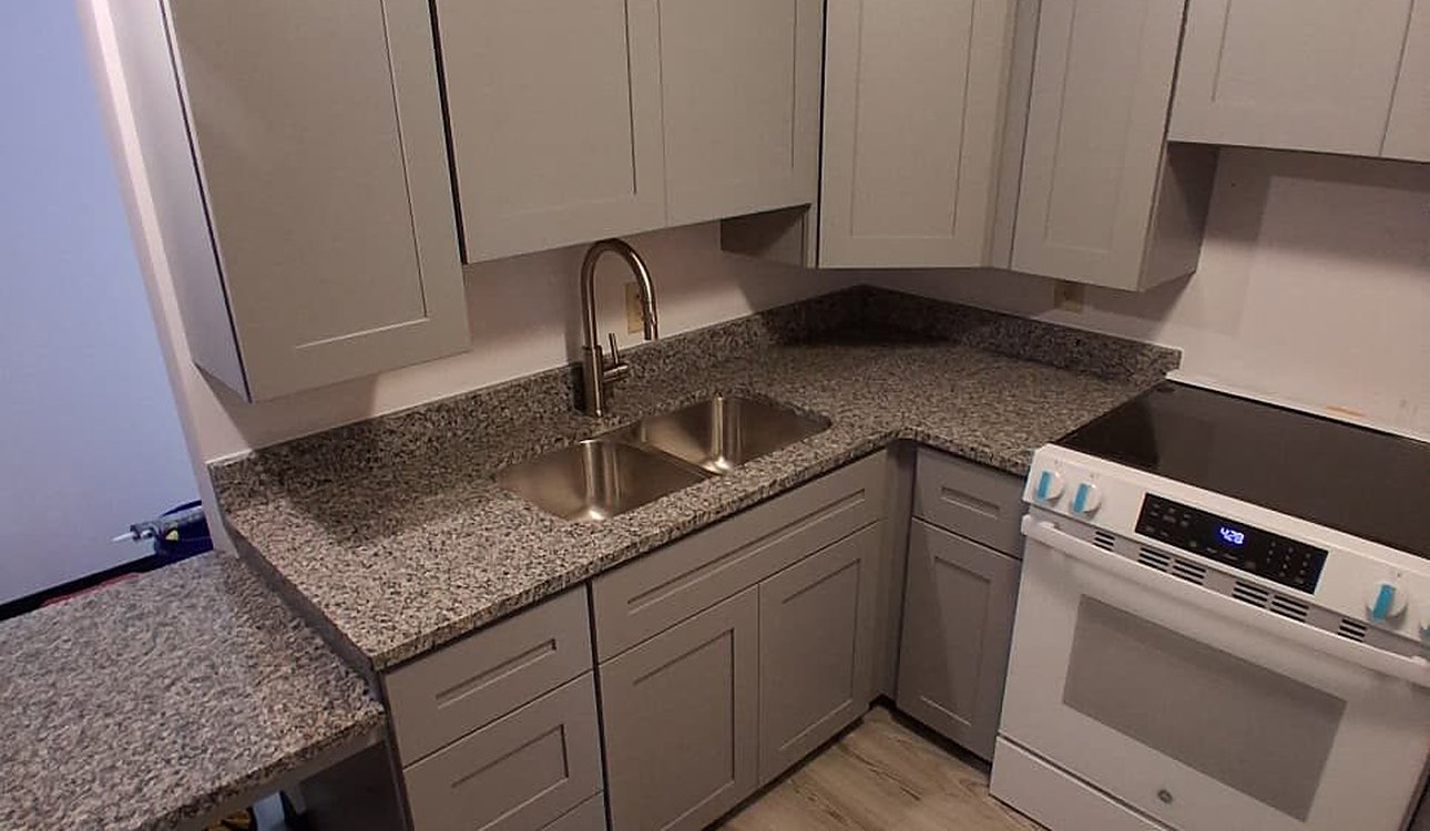 Gray Shaker Kitchen Granite Counters White Range by JL Home Builders, Pittsburgh