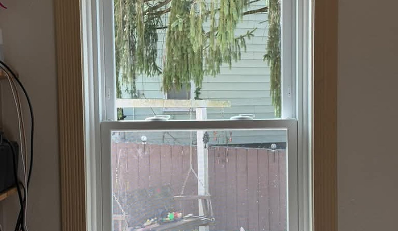 Interior View Of New Double Hung Window With Wood Trim by JL Home Builders, Pittsburgh