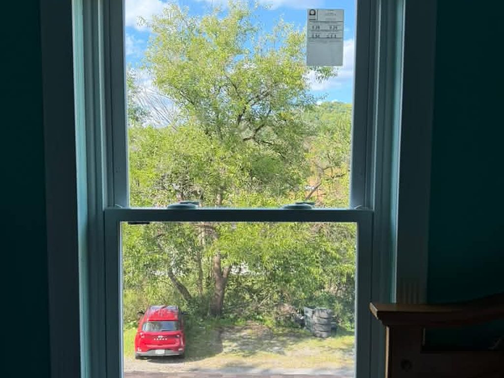 New double-hung window in a teal bedroom, JL Home Builders, Pittsburgh