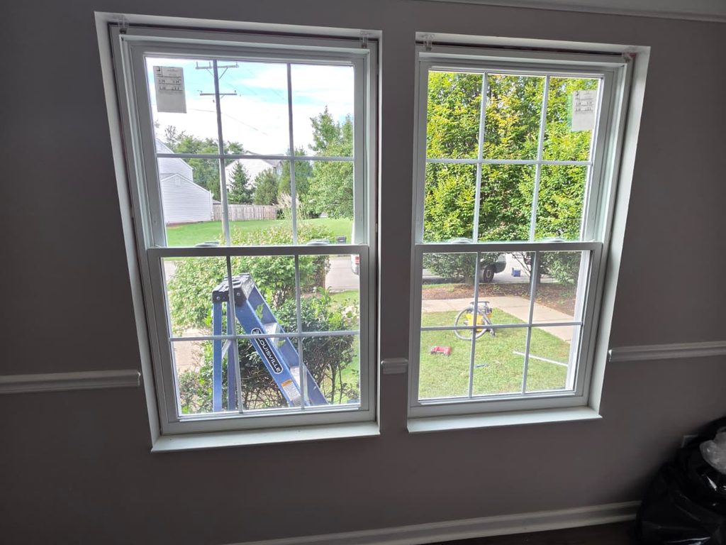 New double-hung replacement windows seen from inside a Pittsburgh home, JL Home Builders