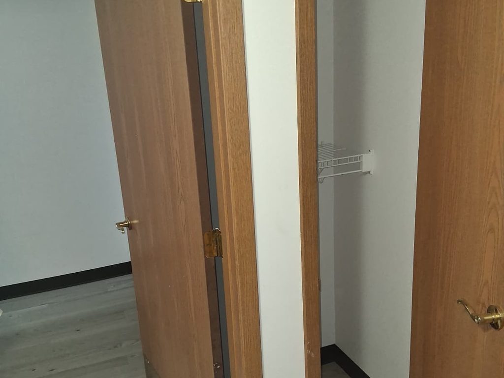 New oak doors and a closet with wire shelving, JL Home Builders, Pittsburgh