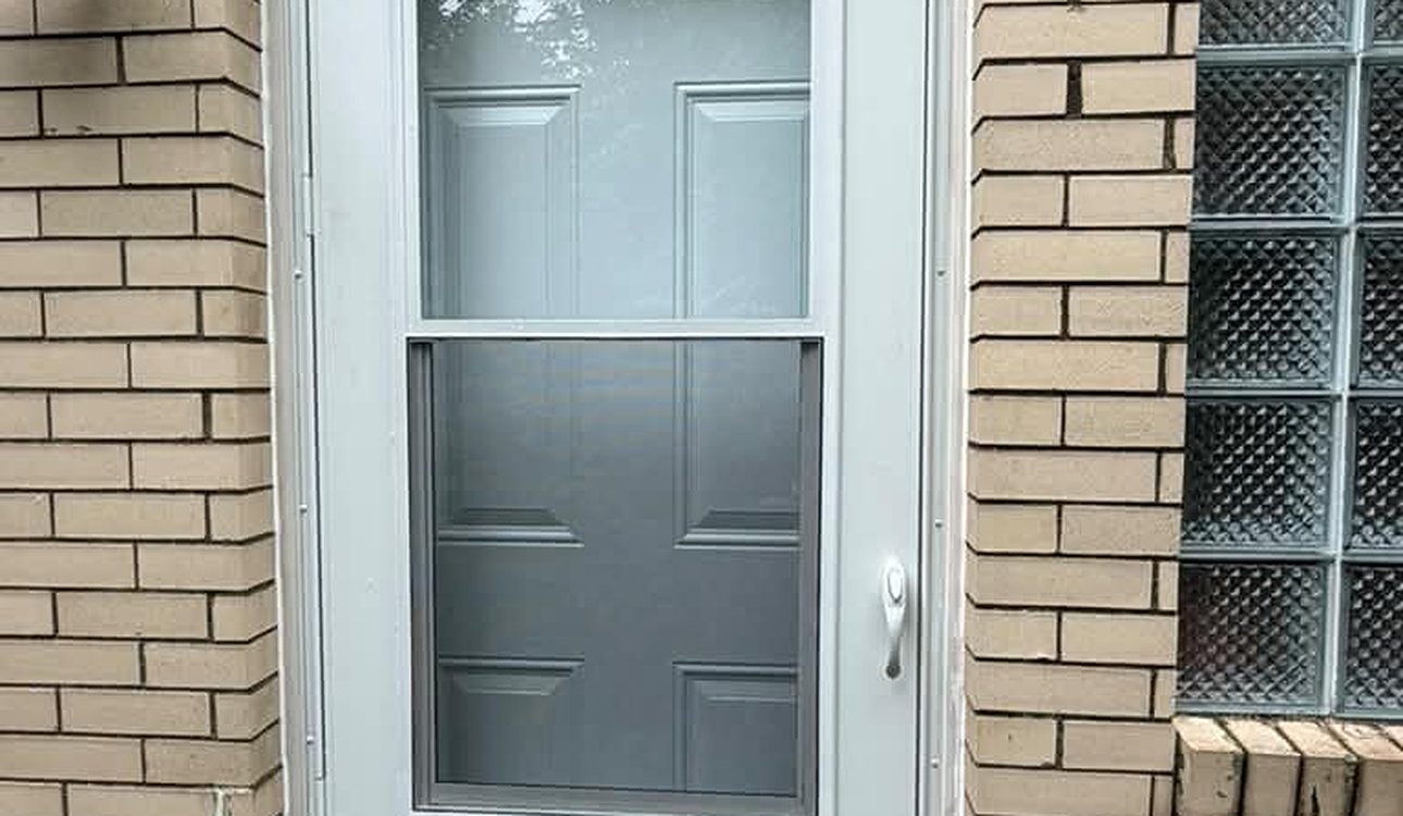 New White Storm Door On Brick Exterior by JL Home Builders, Pittsburgh