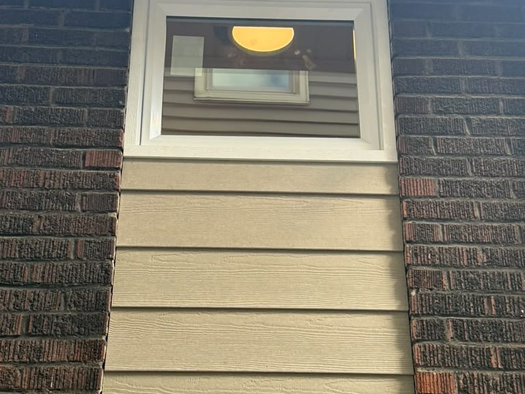 New window with lap siding infill around the opening, JL Home Builders, Pittsburgh