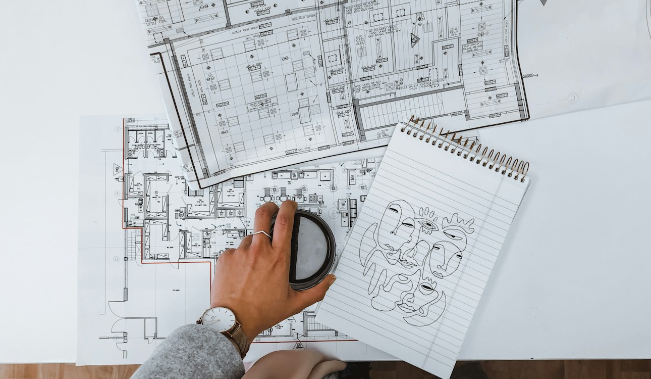 Reviewing house plans during a home remodel project