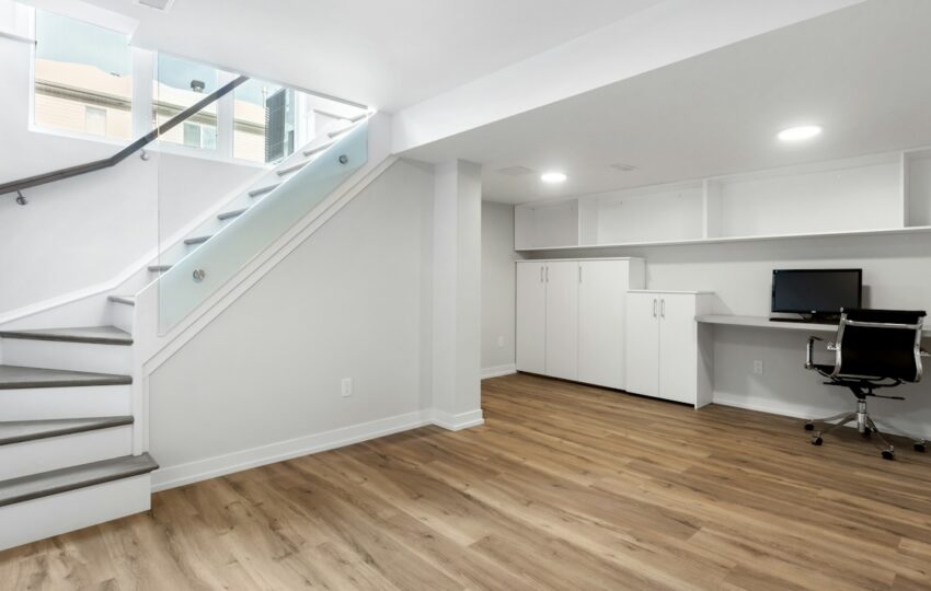 Remodeled basement with staircase and home office nook