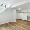 Remodeled basement with staircase and home office nook