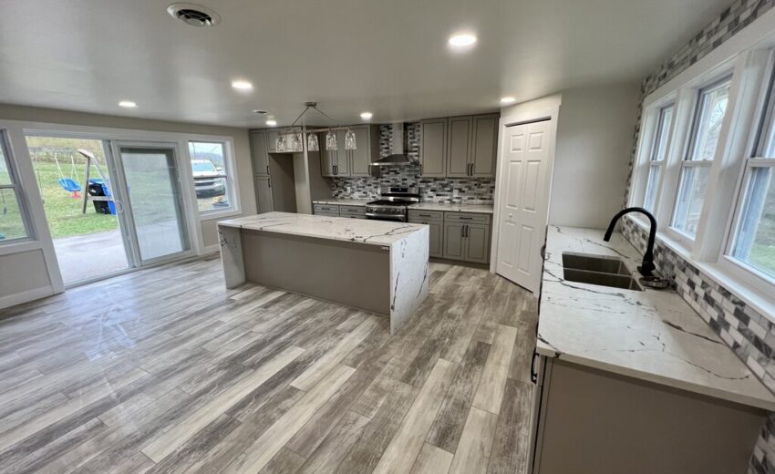 Whole home renovation with open kitchen by JL Home Builders, photo 1