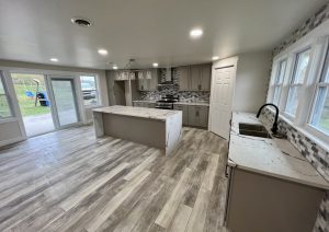 Whole home renovation with open kitchen by JL Home Builders, photo 1