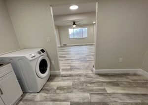 Whole home renovation with open kitchen by JL Home Builders, photo 21