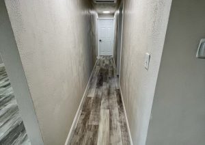 Whole home renovation with open kitchen by JL Home Builders, photo 22